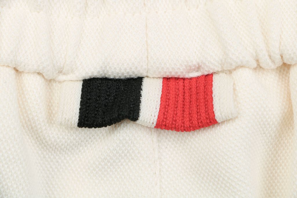 mk-m-logo-diagonal-tape-print-street-shorts-detail
