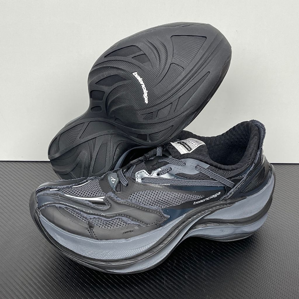 balenciaga-jet-sneaker-black-embossed-chunky-profile-872642wmrtn1000.jpg