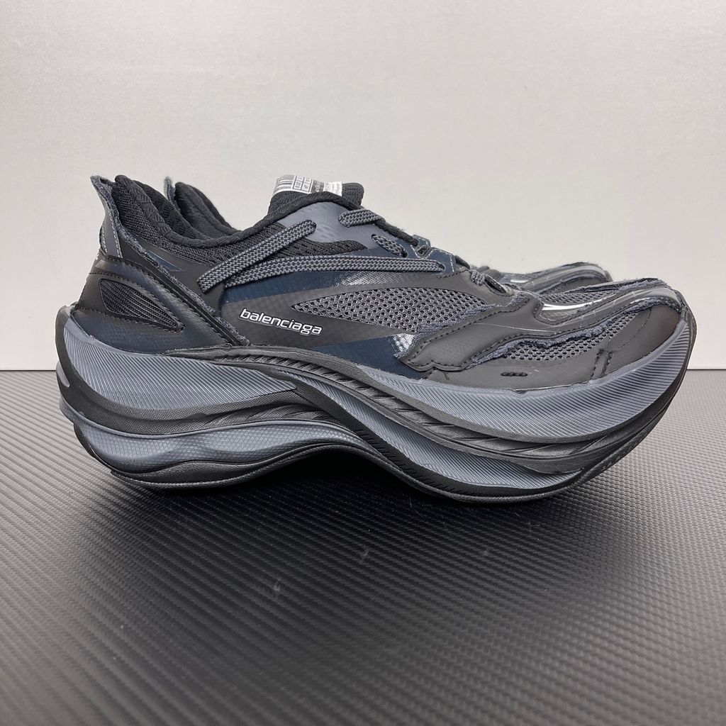 balenciaga-jet-sneaker-black-embossed-chunky-profile-872642wmrtn1000.jpg