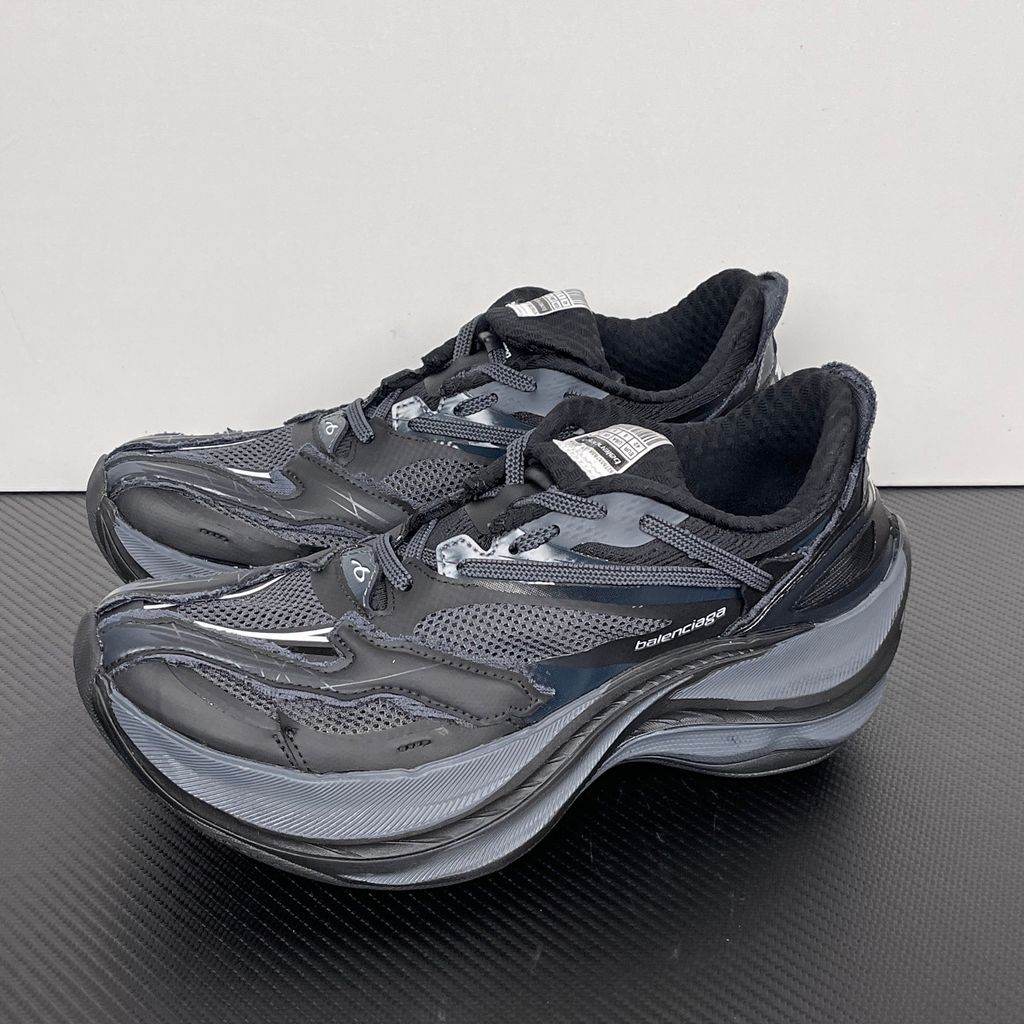 balenciaga-jet-sneaker-black-embossed-chunky-profile-872642wmrtn1000.jpg