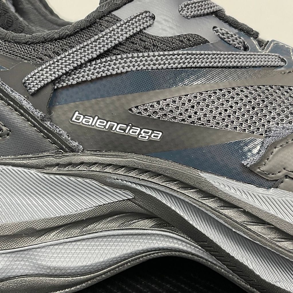 balenciaga-jet-sneaker-black-embossed-chunky-profile-872642wmrtn1000.jpg