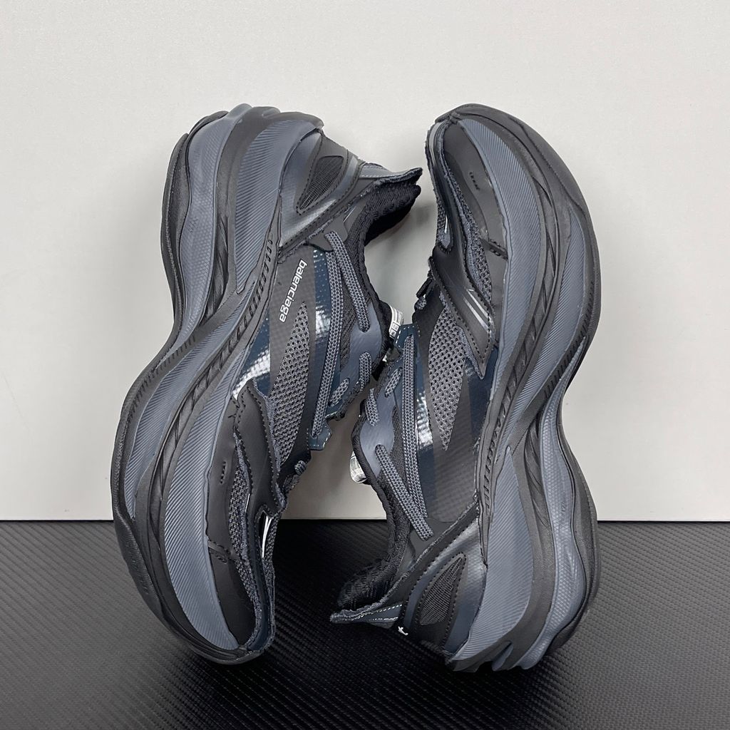 balenciaga-jet-sneaker-black-embossed-chunky-profile-872642wmrtn1000.jpg