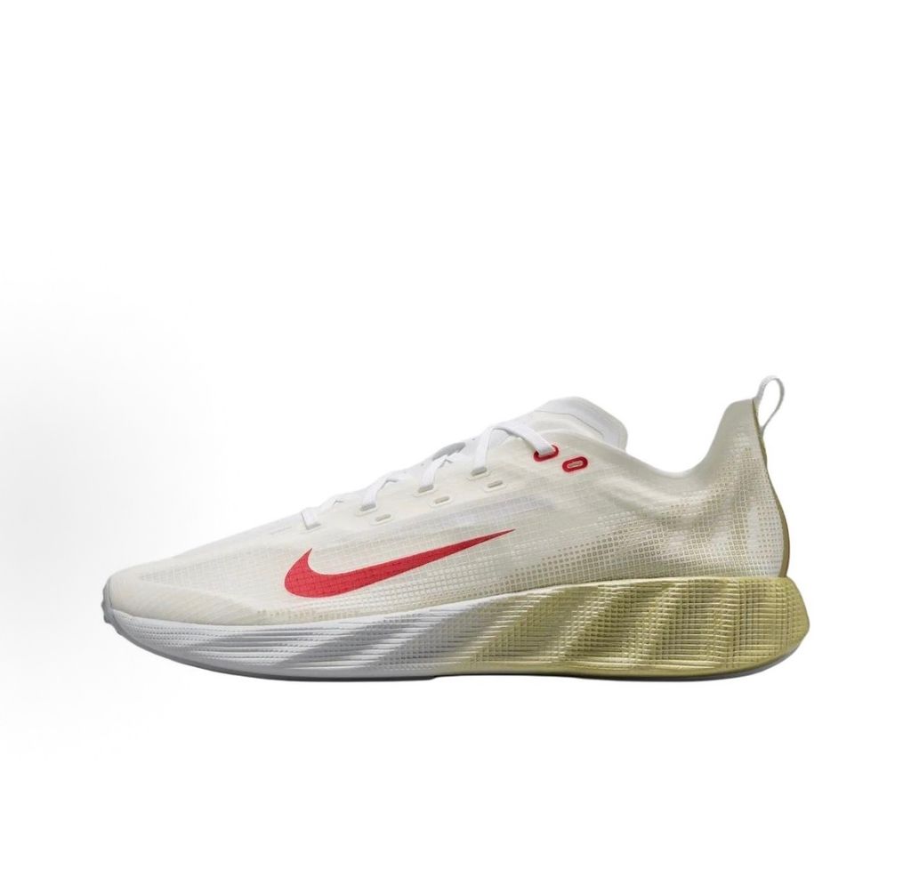 Nike Ava X retro running sneaker in Metallic Silver, Sail, and Midnight Navy, featuring a breathable mesh upper and responsive Cushlon midsole, SKU HM9697-003.