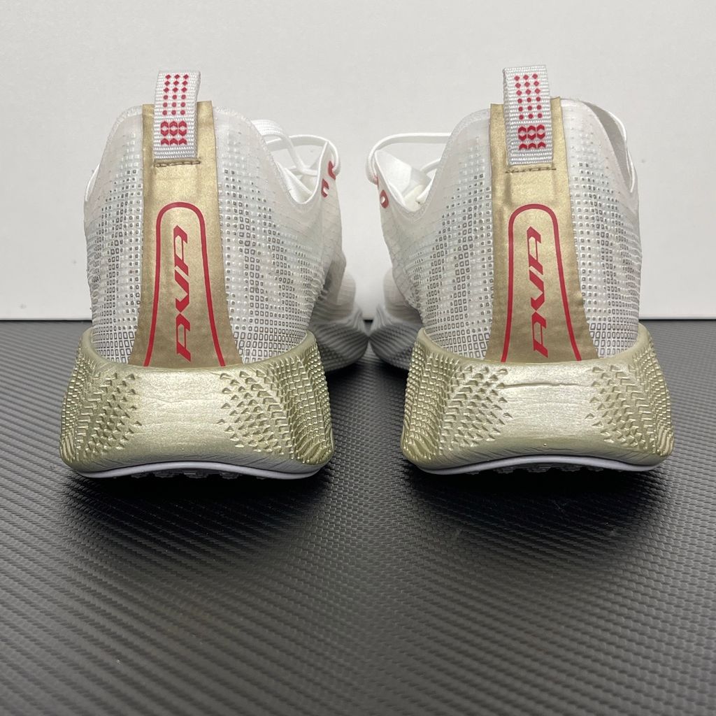 Nike Ava X retro running sneaker in Metallic Silver, Sail, and Midnight Navy, featuring a breathable mesh upper and responsive Cushlon midsole, SKU HM9697-003.
