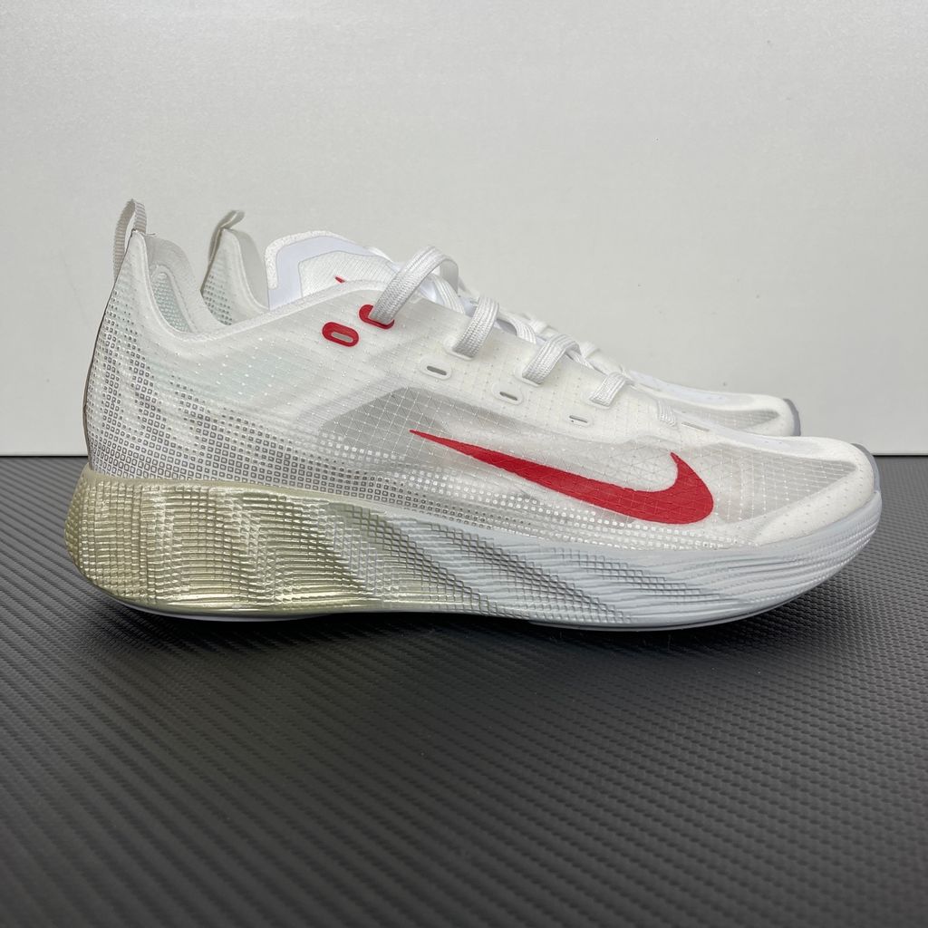 Nike Ava X retro running sneaker in Metallic Silver, Sail, and Midnight Navy, featuring a breathable mesh upper and responsive Cushlon midsole, SKU HM9697-003..jpg