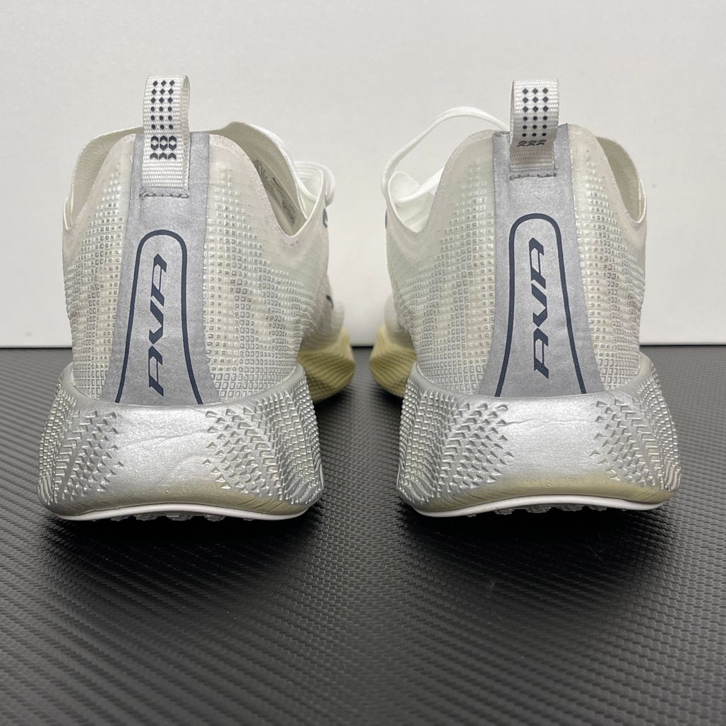 Nike Ava X retro running sneaker in Metallic Silver, Alabaster, and Midnight Navy, featuring a breathable mesh upper and responsive Cushlon midsole, SKU HM9697-003.