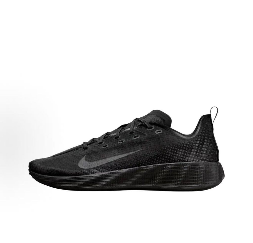 Nike Ava X lightweight running sneaker in stealth Black and Anthracite, featuring a breathable mesh upper and blacked-out Cushlon midsole, SKU HM9697-004.