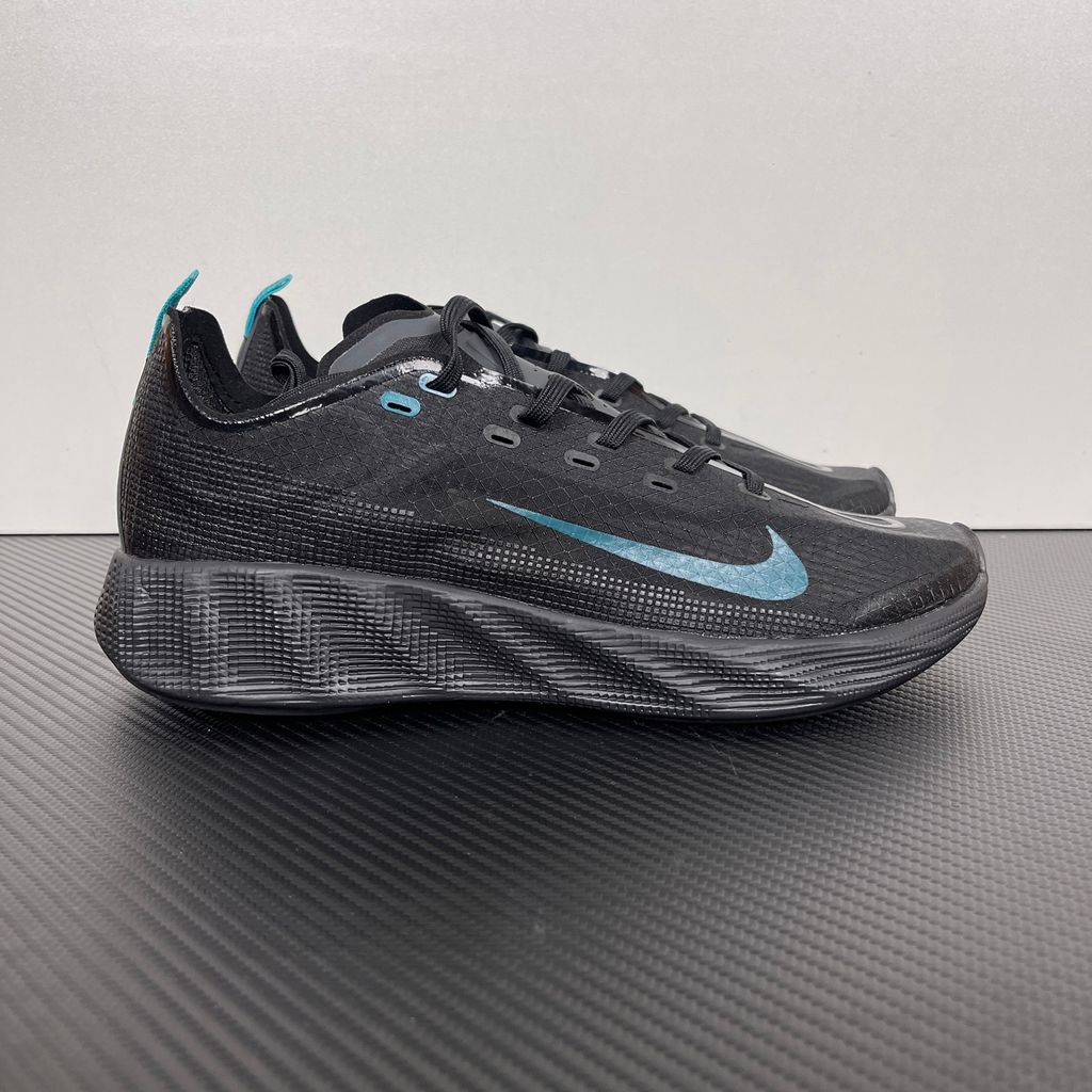 Nike Ava X lightweight running sneaker in Anthracite and Black with vibrant Energy accents, featuring a breathable mesh upper and Cushlon midsole, SKU HM9697-006.