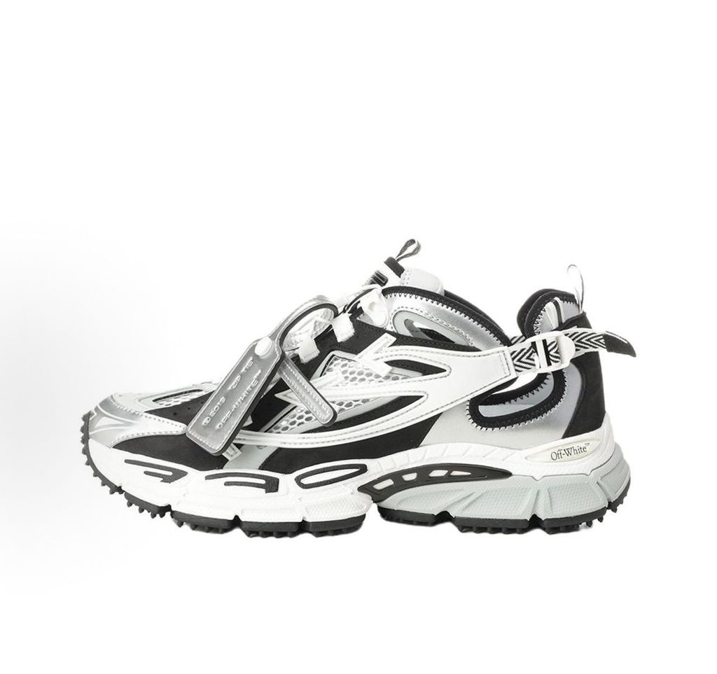 Authentic Off-White Be Right Back (BRB) sneaker in metallic silver, white, and black, featuring a technical mesh base and the signature Off-White Arrow logo on the lateral side, SKU OMIA29SS26FAB0017210.