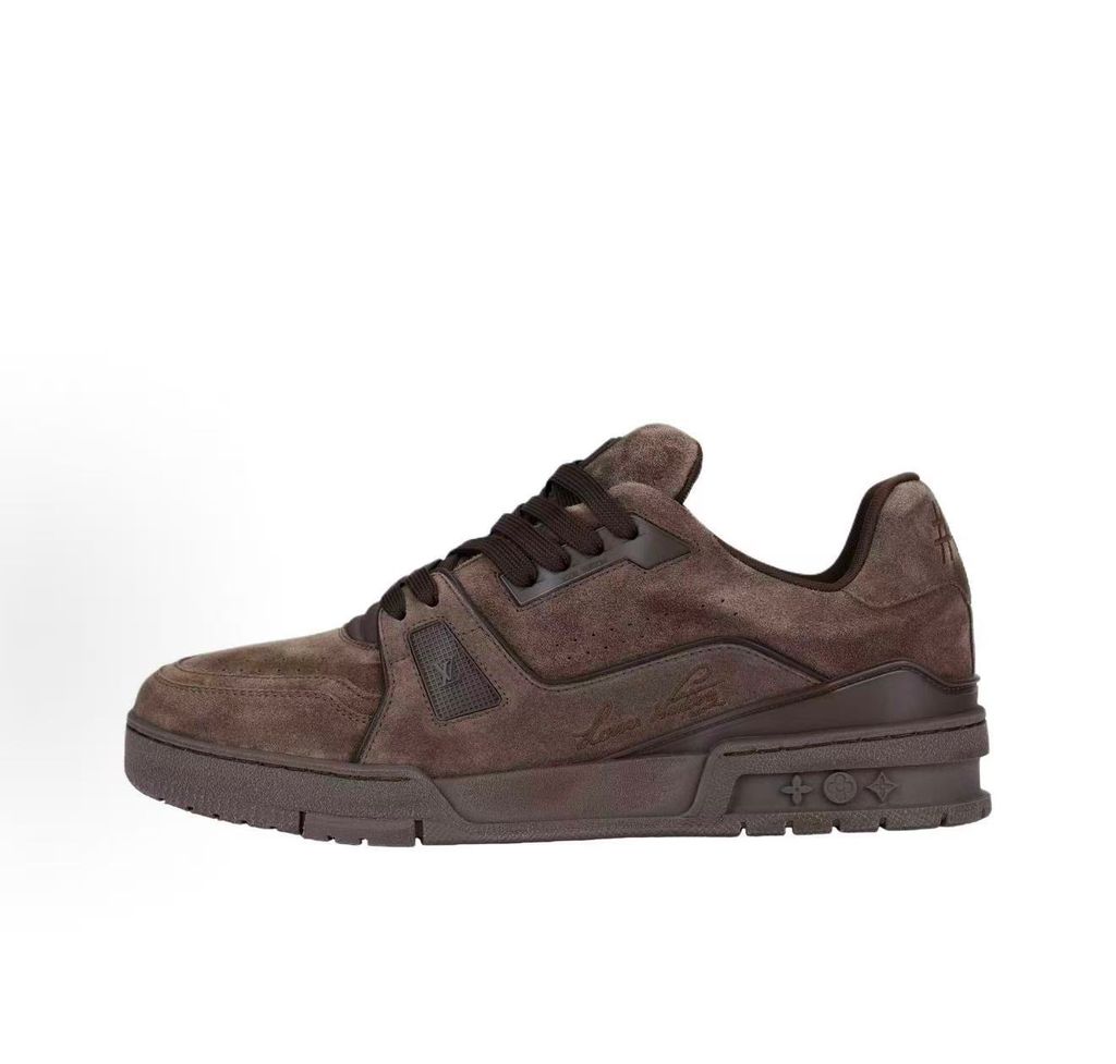 Tyler, The Creator x Louis Vuitton LV Trainer in deep brown suede, featuring the signature Louis Vuitton script on the side panel, monogram flowers on the midsole, and a custom colorful wavy lace tag..pic