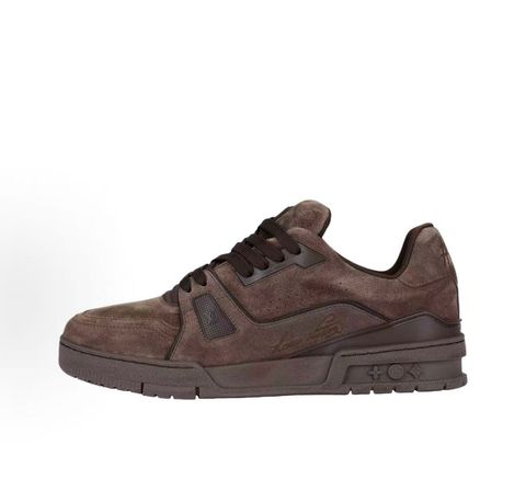 Tyler, The Creator x Louis Vuitton LV Trainer in deep brown suede, featuring the signature Louis Vuitton script on the side panel, monogram flowers on the midsole, and a custom colorful wavy lace tag..pic