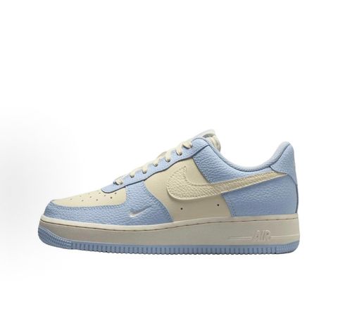 Nike Women's Air Force 1 '07 sneaker in Hydrogen Blue and Soft Pearl, featuring textured tumbled leather overlays, a cream Swoosh, and a mini embroidered Swoosh, SKU IV3222-400.