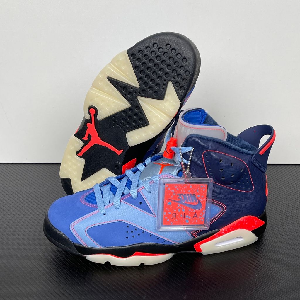 Limited edition Jordan 6 Retro x Awake NY collaboration sneaker in Midnight Navy, featuring a premium nubuck upper and visible Air cushioning, SKU IQ5706-400.