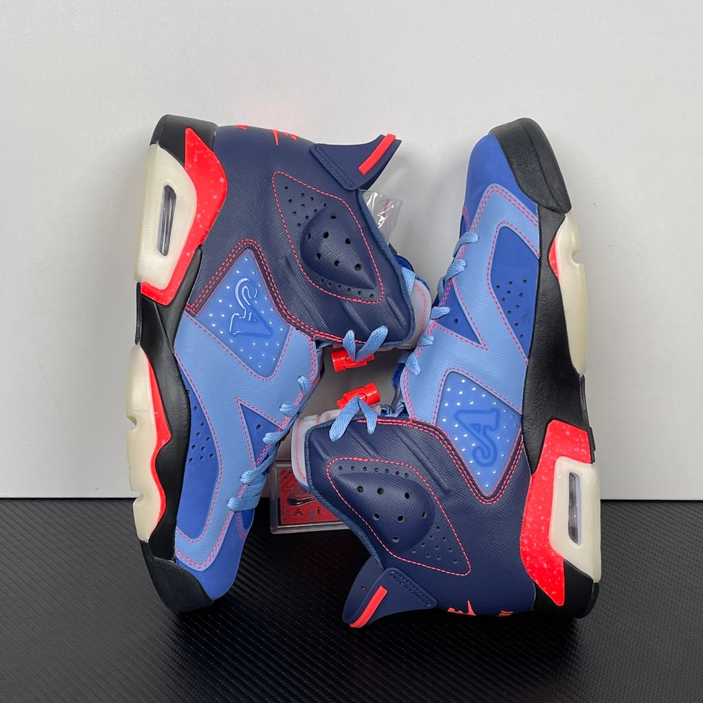 Limited edition Jordan 6 Retro x Awake NY collaboration sneaker in Midnight Navy, featuring a premium nubuck upper and visible Air cushioning, SKU IQ5706-400.