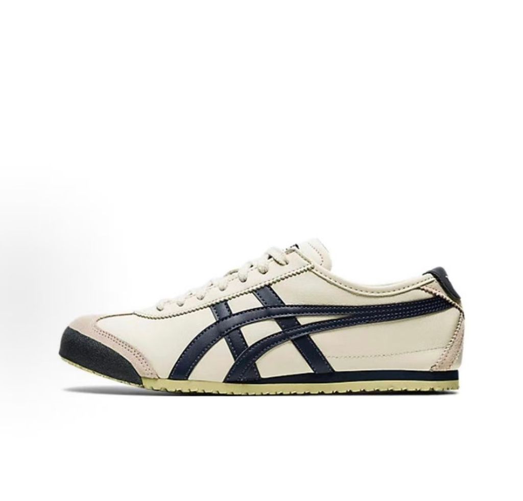 Onitsuka Tiger Mexico 66 vintage running sneaker in Birch and Peacoat navy, featuring a cream leather upper and signature side stripes, SKU 1183C102-200.