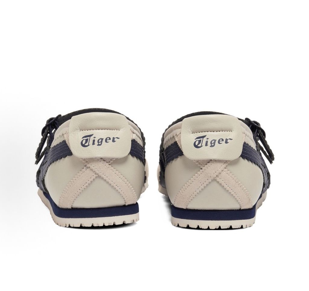 : Onitsuka Tiger Mexico 66 TGRS vintage running sneaker in Birch and Peacoat navy, featuring a cream leather upper and signature side stripes, SKU 1182A678-200.