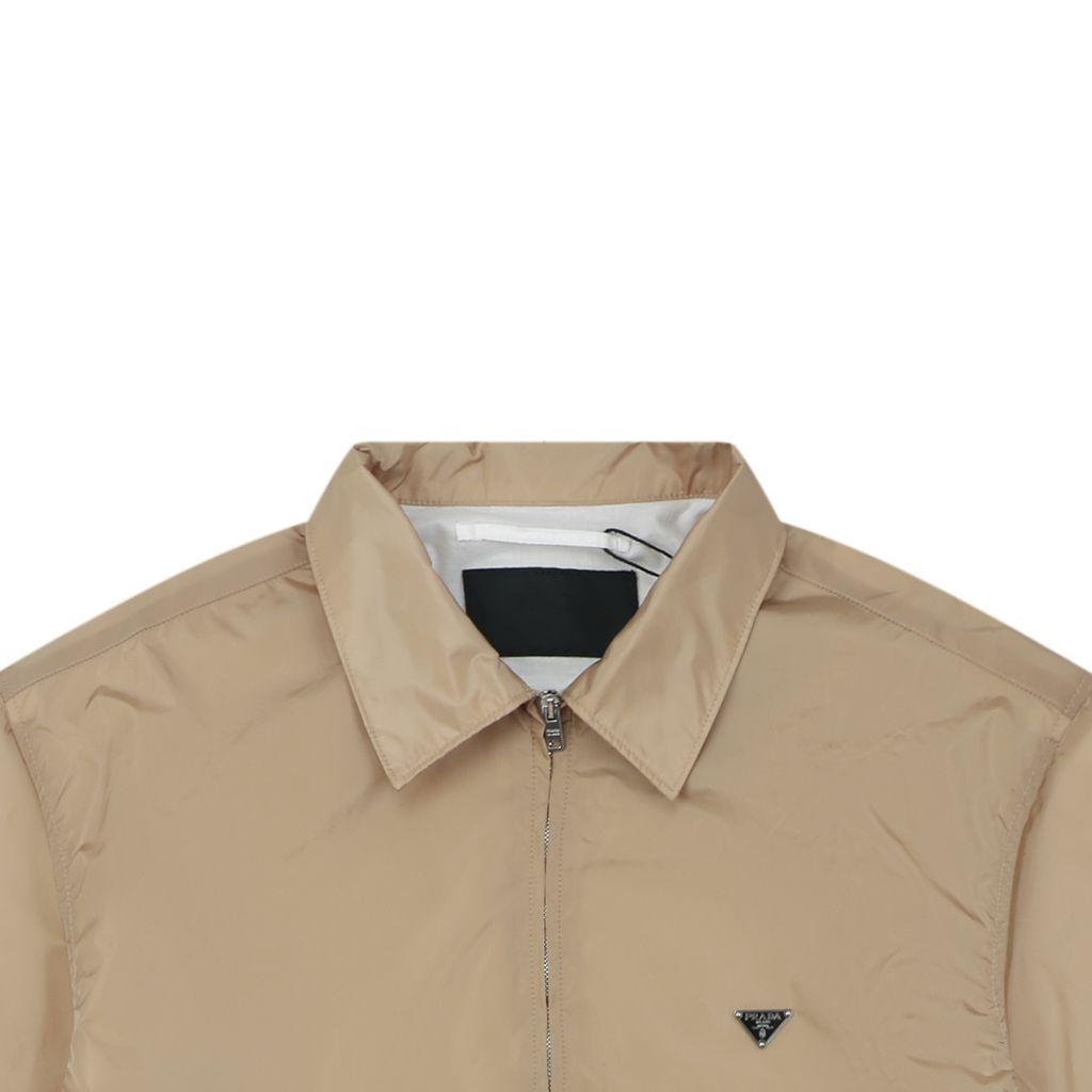 prada-recycled-nylon-triangle-logo-zip-shirt