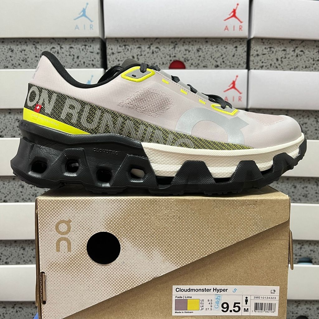 On Running Cloudmonster Hyper maximalist running shoe in Fade grey and Lime green, featuring a massive dual-tone CloudTec midsole and bold 'ON RUNNING' side branding, SKU 3ME10134323.
