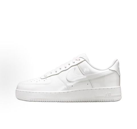 Nike Air Force 1 Low '07 Premium sneaker in high-gloss White Patent leather, featuring a tonal white Swoosh and classic chunky rubber sole, SKU IV2857-100.