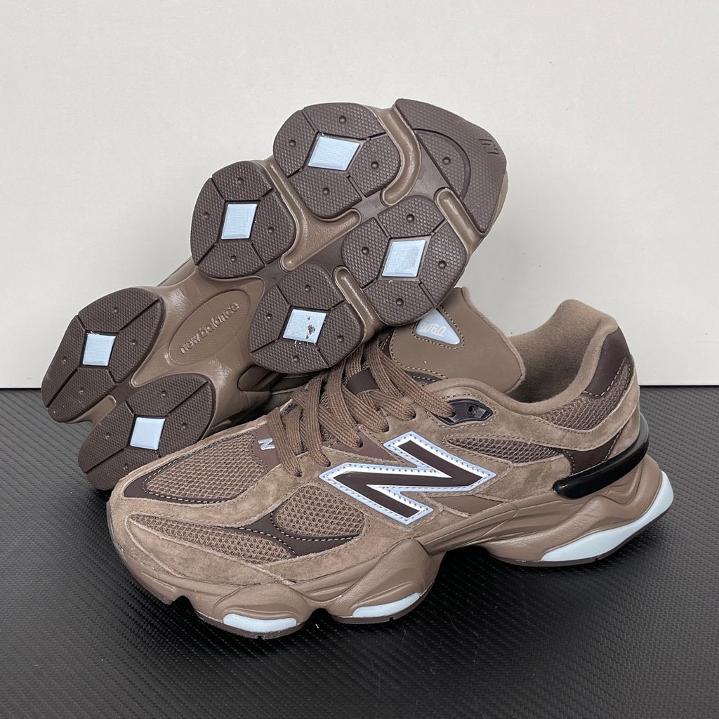 New Balance 9060 chunky retro-futuristic sneaker in rich brown and icy blue, featuring a premium suede and mesh upper, SKU U9060622.