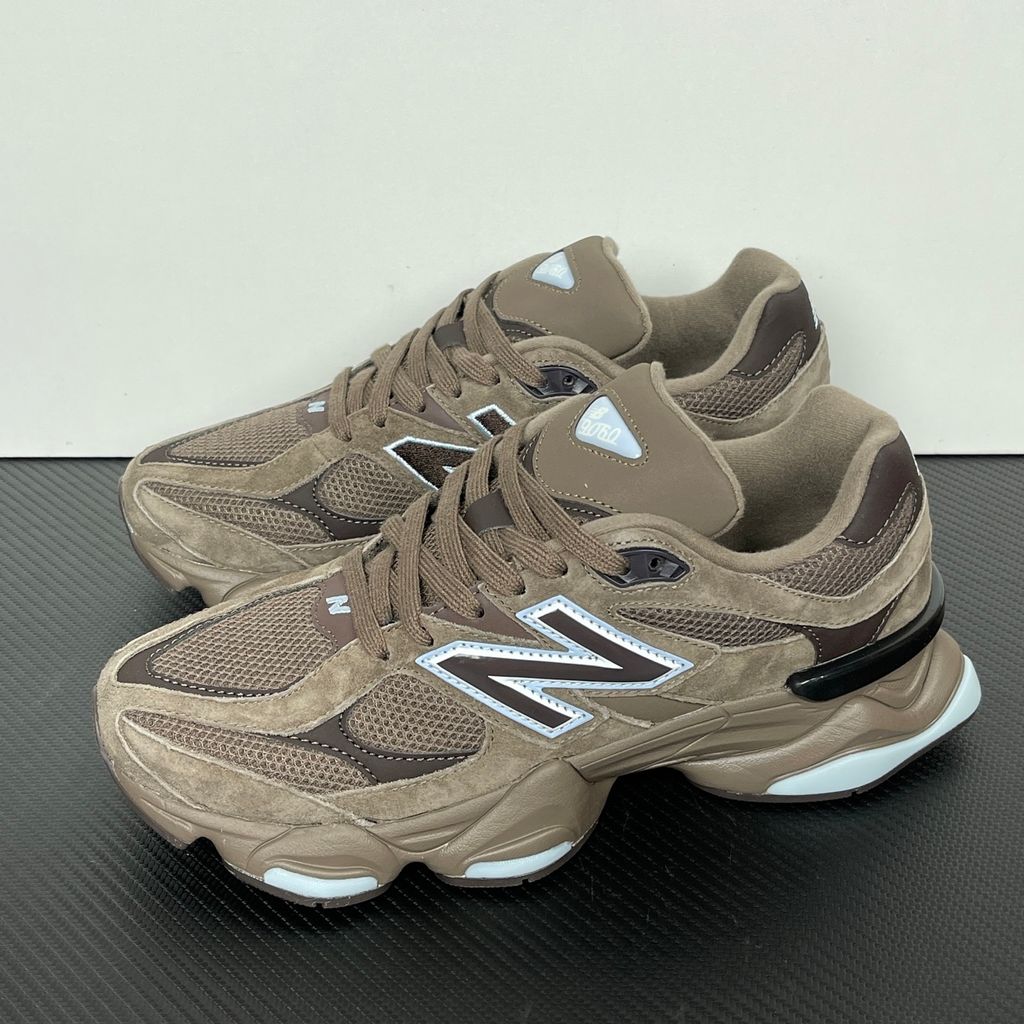 New Balance 9060 chunky retro-futuristic sneaker in rich brown and icy blue, featuring a premium suede and mesh upper, SKU U9060622.