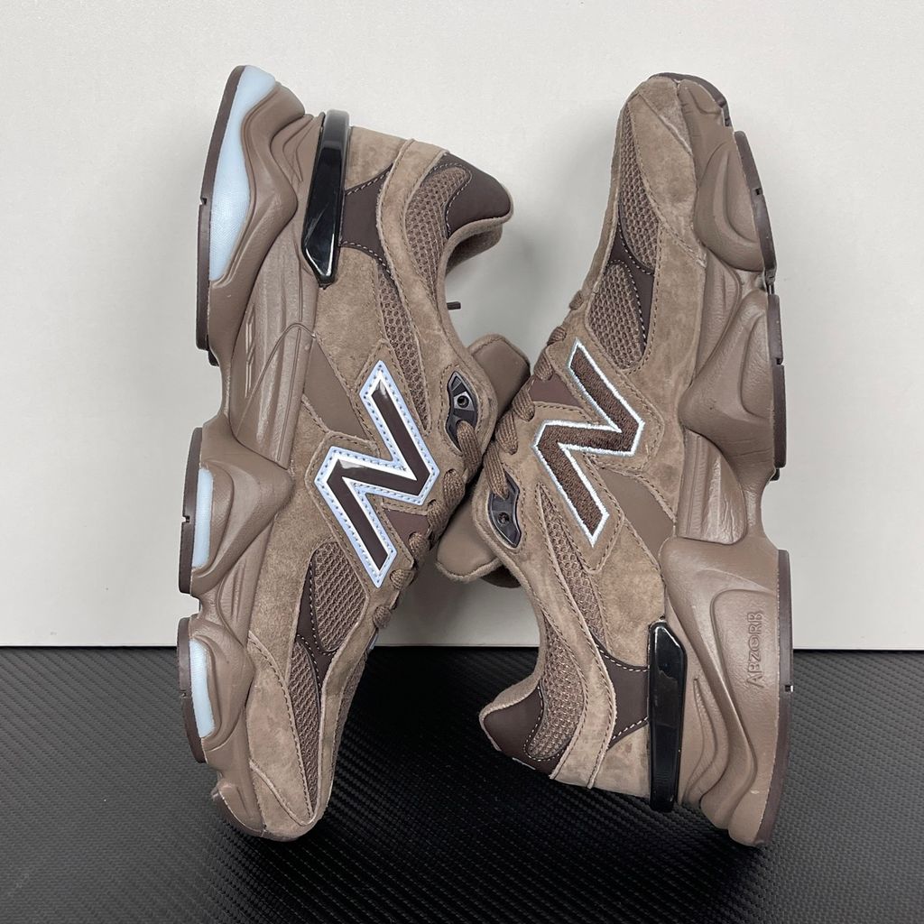 New Balance 9060 chunky retro-futuristic sneaker in rich brown and icy blue, featuring a premium suede and mesh upper, SKU U9060622.
