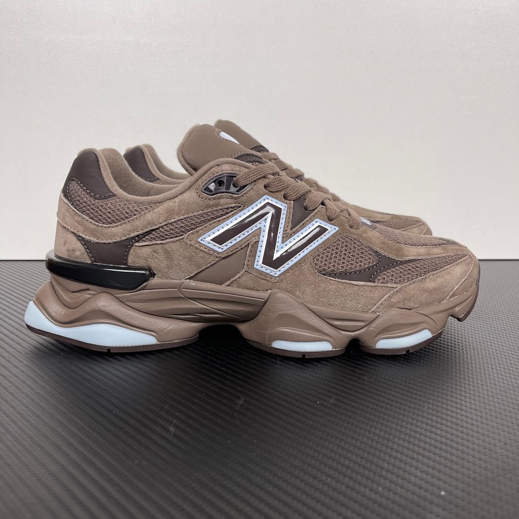 New Balance 9060 chunky retro-futuristic sneaker in rich brown and icy blue, featuring a premium suede and mesh upper, SKU U9060622.