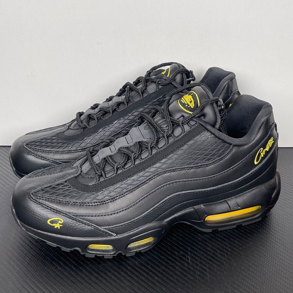 Limited edition Nike Air Max 95 x Corteiz (CRTZ RTW) sneaker in Honey and Black, featuring premium leather overlays, netted mesh, and visible Air units, SKU FB2709-003.