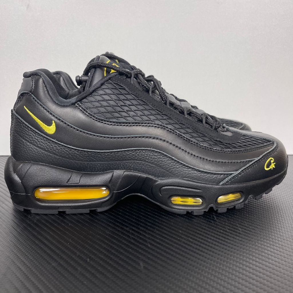 Limited edition Nike Air Max 95 x Corteiz (CRTZ RTW) sneaker in Honey and Black, featuring premium leather overlays, netted mesh, and visible Air units, SKU FB2709-003.