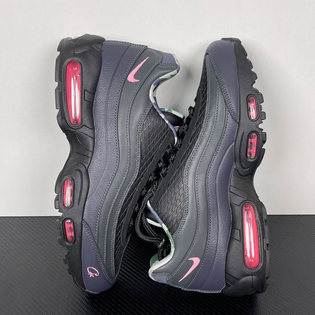 Limited edition Nike Air Max 95 SP x Corteiz (CRTZ RTW) sneaker in Black and Pink Beam, featuring premium leather overlays, netted mesh, and neon pink visible Air units, SKU FB2709-001.
