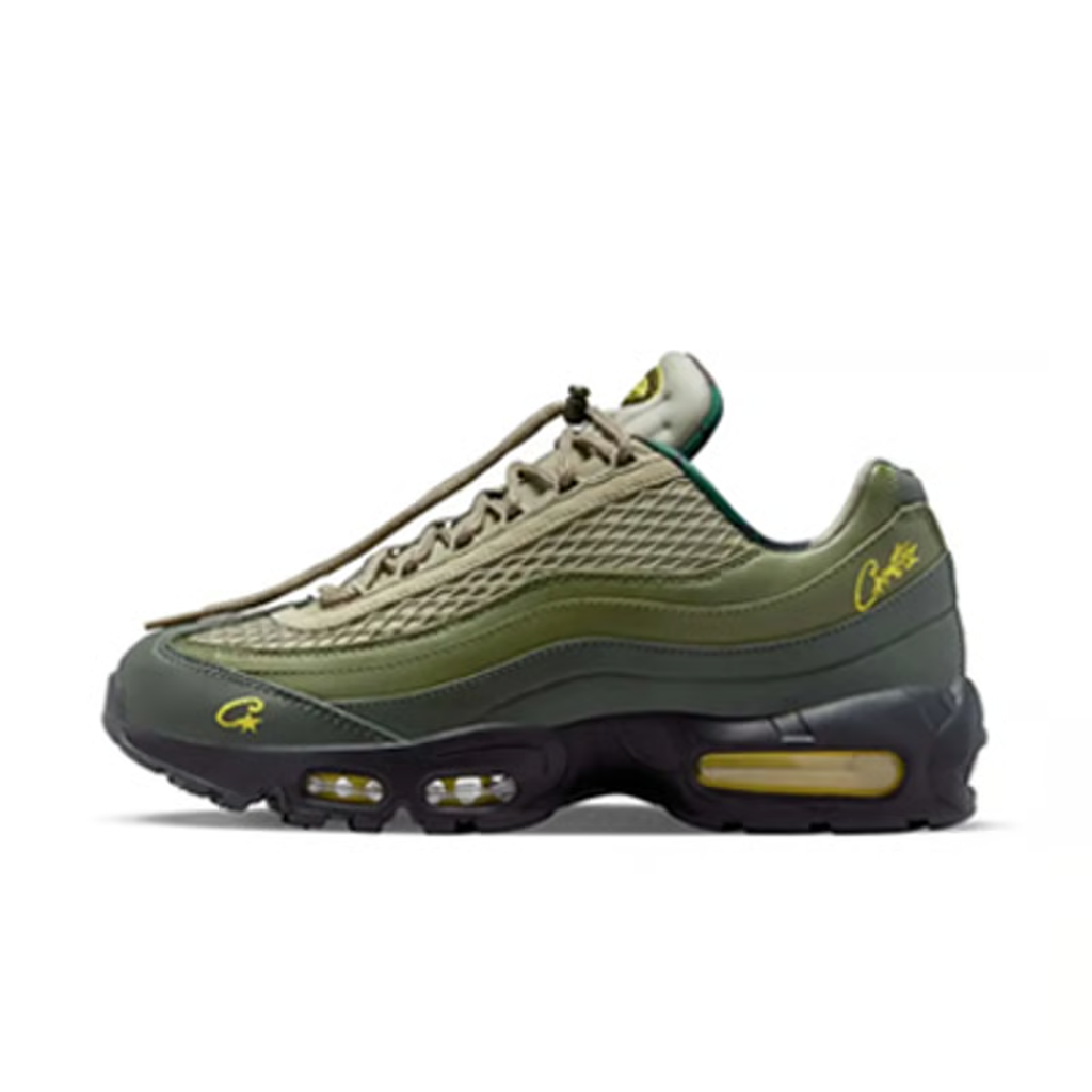 Limited edition Nike Air Max 95 SP x Corteiz (CRTZ RTW) sneaker in Gutta Green and Black, featuring premium olive leather overlays, netted mesh, and vibrant yellow visible Air units, SKU FB2709-300.