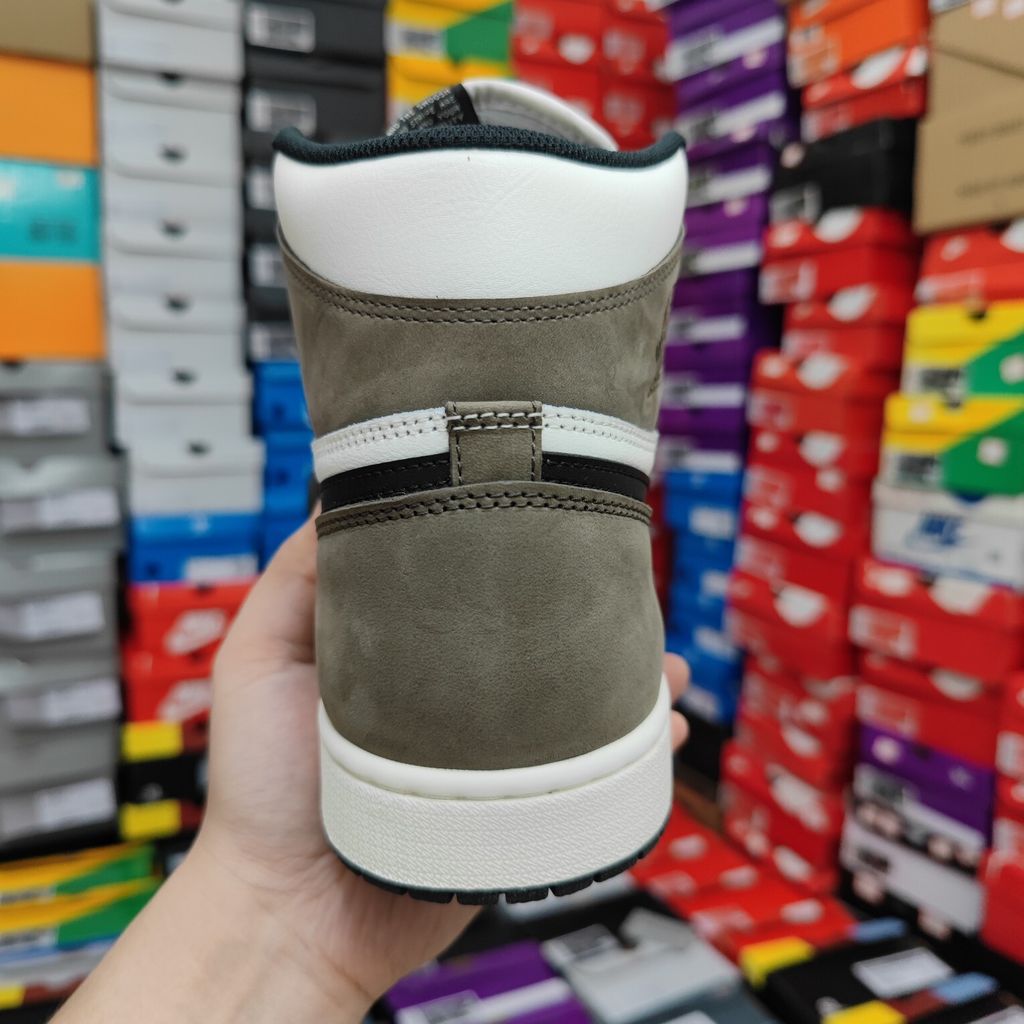 Air Jordan 1 Retro High OG high-top sneaker featuring a Sail white leather base, Black leather forefoot overlays, and Dark Mocha brown suede on the heel, SKU 555088-105.