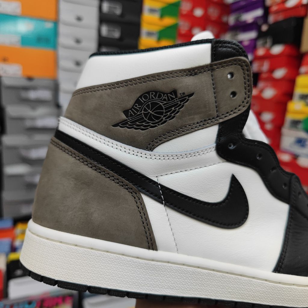 Air Jordan 1 Retro High OG high-top sneaker featuring a Sail white leather base, Black leather forefoot overlays, and Dark Mocha brown suede on the heel, SKU 555088-105.