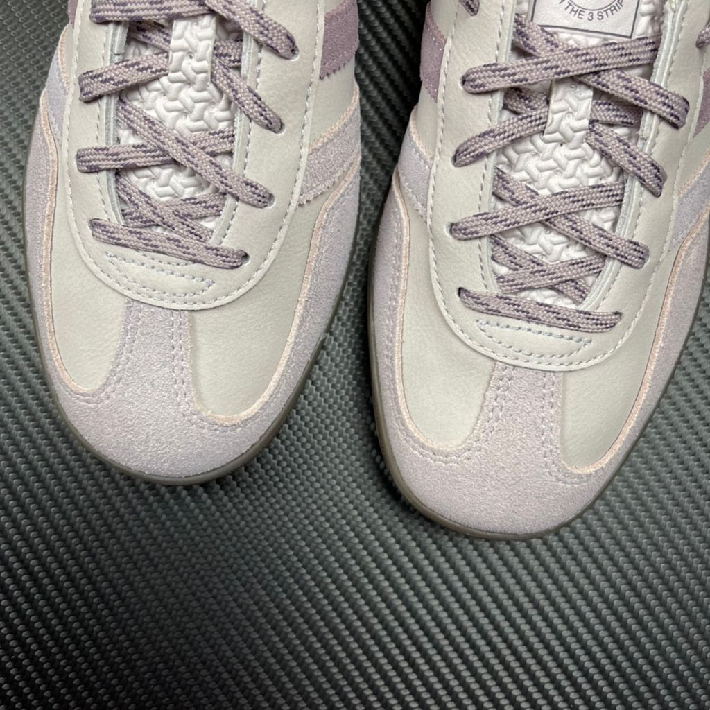 adidas Gazelle Indoor x Kith Classics vintage terrace sneaker in Ash Purple suede, featuring white tumbled leather Three Stripes and a translucent gum rubber sole, SKU IH0120.