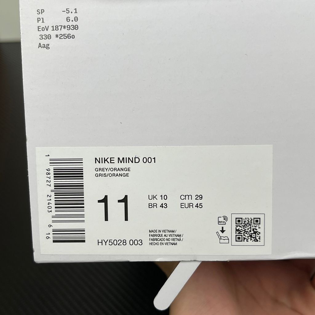 Nike x NOCTA Mind 001 premium lifestyle slide in a monochromatic light grey, featuring a tactical, tech-wear inspired molded upper and subtle NOCTA branding.