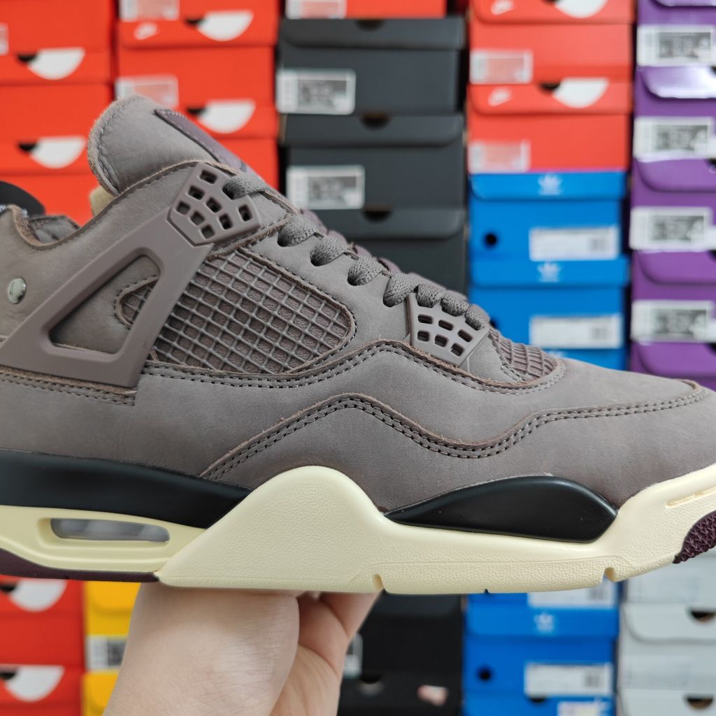 Air Jordan 4 Retro SP x A Ma Maniére sneaker featuring a monochromatic muted purple "Violet Ore" premium nubuck upper, black netting, and an aged sail midsole, SKU DV6773-220..jpg