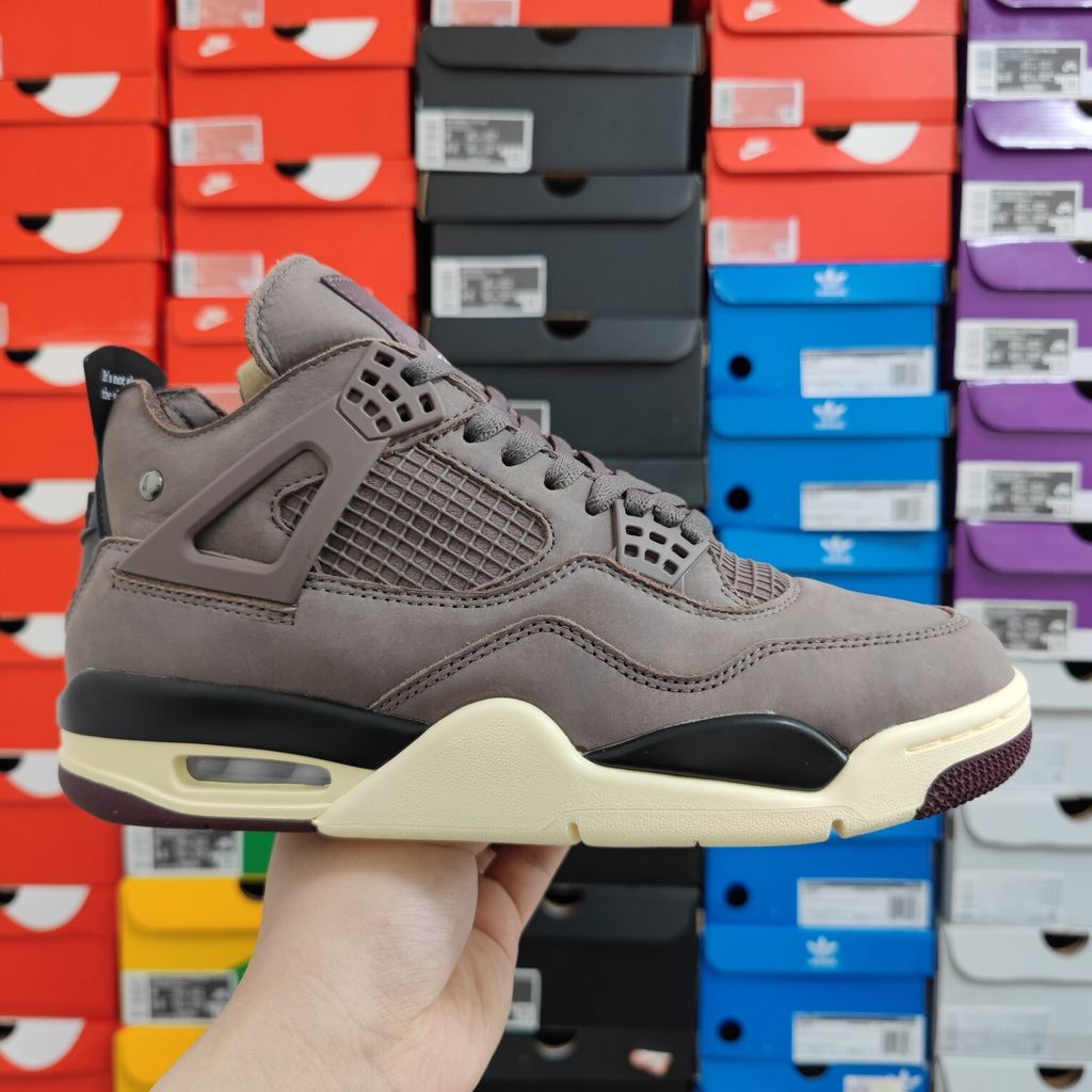Air Jordan 4 Retro SP x A Ma Maniére sneaker featuring a monochromatic muted purple "Violet Ore" premium nubuck upper, black netting, and an aged sail midsole, SKU DV6773-220.