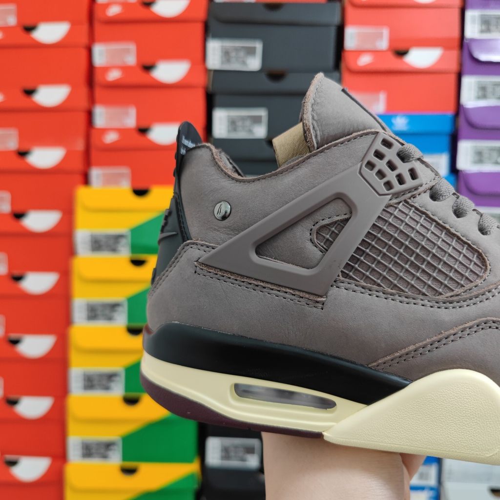 Air Jordan 4 Retro SP x A Ma Maniére sneaker featuring a monochromatic muted purple "Violet Ore" premium nubuck upper, black netting, and an aged sail midsole, SKU DV6773-220.