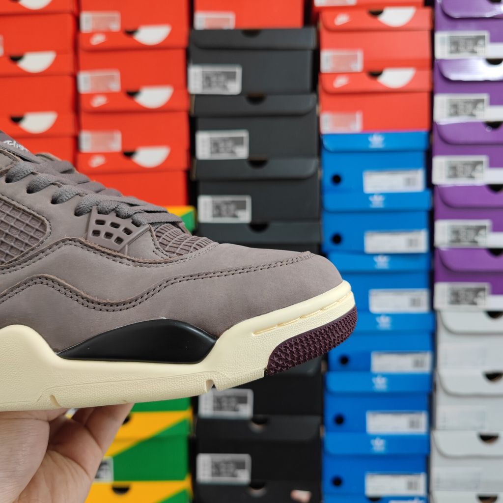 Air Jordan 4 Retro SP x A Ma Maniére sneaker featuring a monochromatic muted purple "Violet Ore" premium nubuck upper, black netting, and an aged sail midsole, SKU DV6773-220.