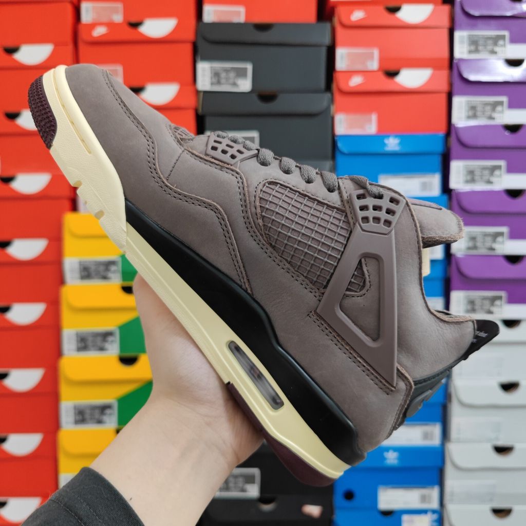 Air Jordan 4 Retro SP x A Ma Maniére sneaker featuring a monochromatic muted purple "Violet Ore" premium nubuck upper, black netting, and an aged sail midsole, SKU DV6773-220.