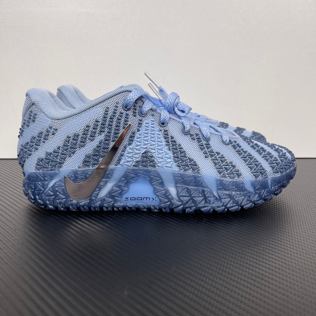 Nike Ja 3 All-Star basketball shoe in a vibrant galactic blue colorway, featuring a breathable mesh upper, iridescent silver Nike Swoosh, and a translucent icy outsole, SKU HF2794-400.