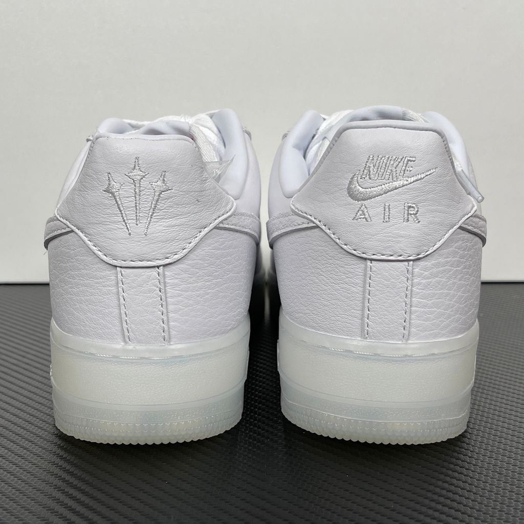 Nike Air Force 1 Low x Drake NOCTA "Certified Lover Boy" sneaker in pristine white premium leather with subtle Cobalt Tint accents and custom NOCTA heel branding, SKU CZ8065-101..jpg