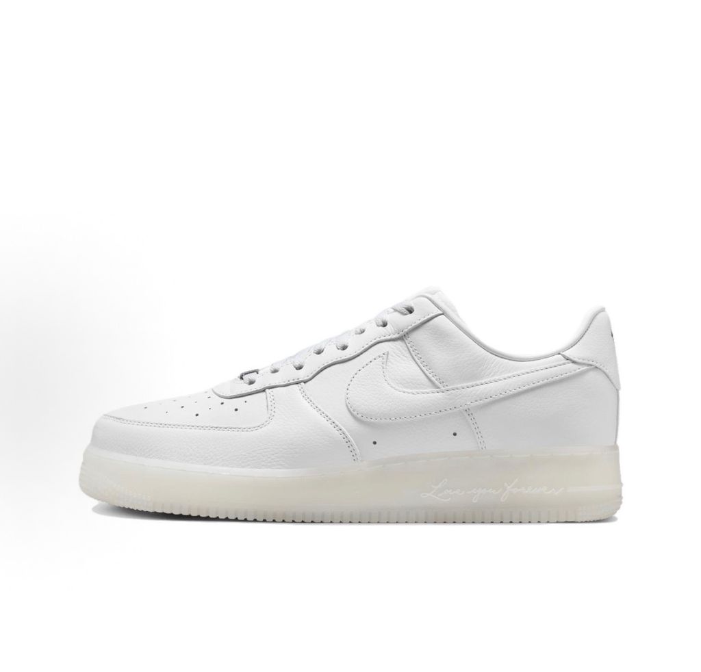 Nike Air Force 1 Low x Drake NOCTA "Certified Lover Boy" sneaker in pristine white premium leather with subtle Cobalt Tint accents and custom NOCTA heel branding, SKU CZ8065-101.