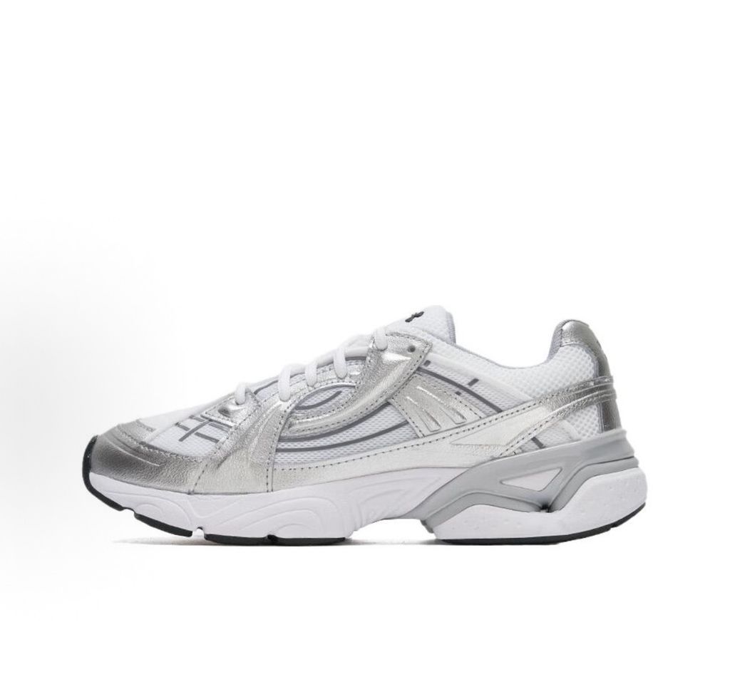 Under Armour UA Sola retro tech-runner side profile, featuring a clean white breathable mesh upper, dynamic metallic silver synthetic overlays, and a chunky white midsole, SKU 6005284-100.