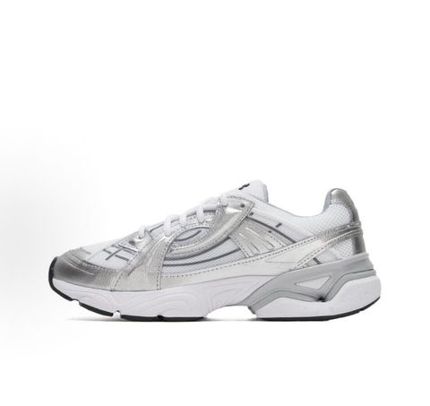 Under Armour UA Sola retro tech-runner side profile, featuring a clean white breathable mesh upper, dynamic metallic silver synthetic overlays, and a chunky white midsole, SKU 6005284-100.