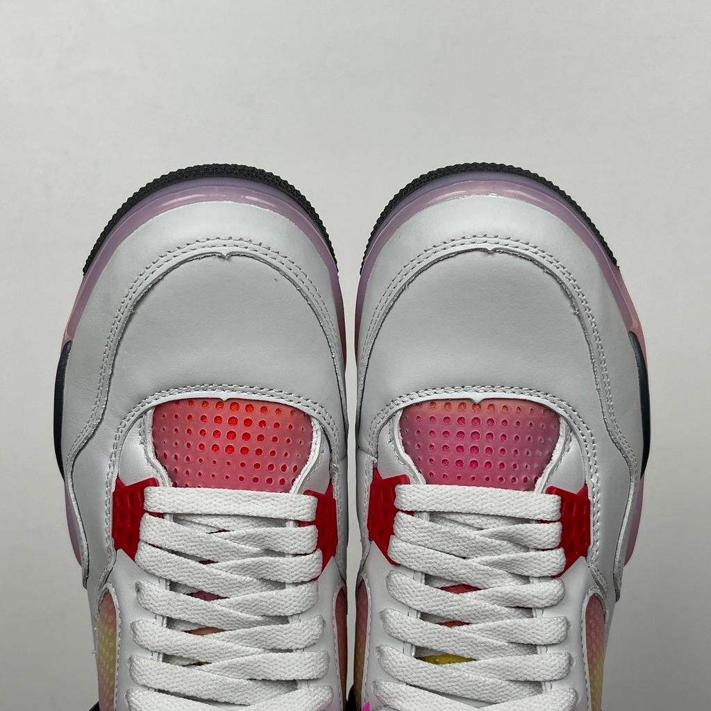 Vibrant, multi-colored accents and playful graphic details give this classic silhouette a fresh, animated energy that stands out from traditional heritage colorways.