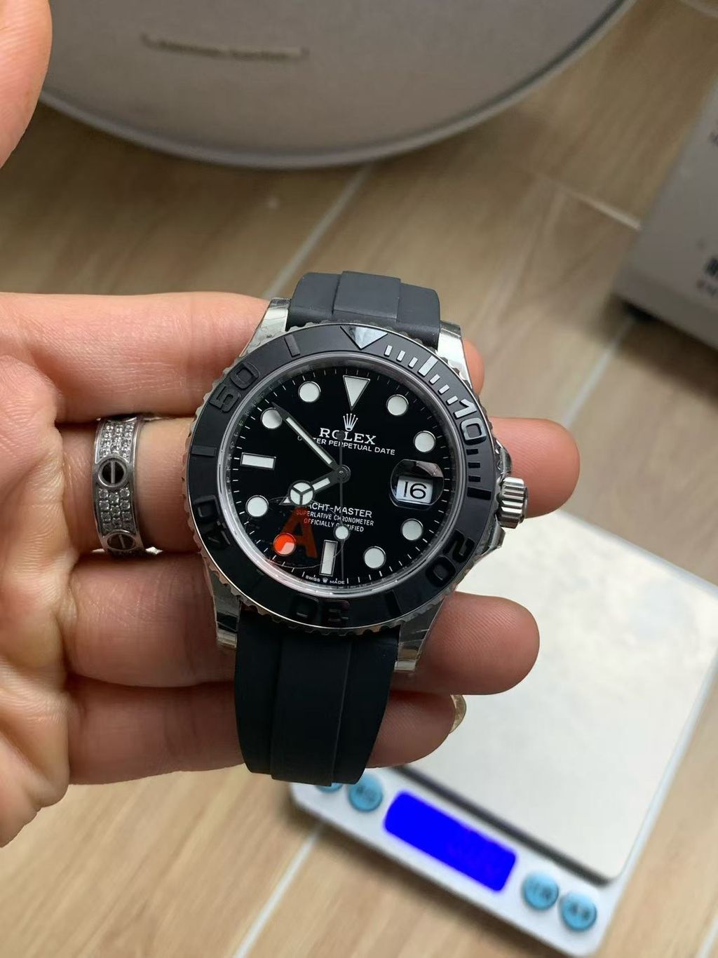 Rolex Yacht-Master 42 luxury timepiece featuring a 42 mm 18 ct white gold case, black dial with Chromalight display, and an innovative black Oysterflex bracelet, reference 226659.