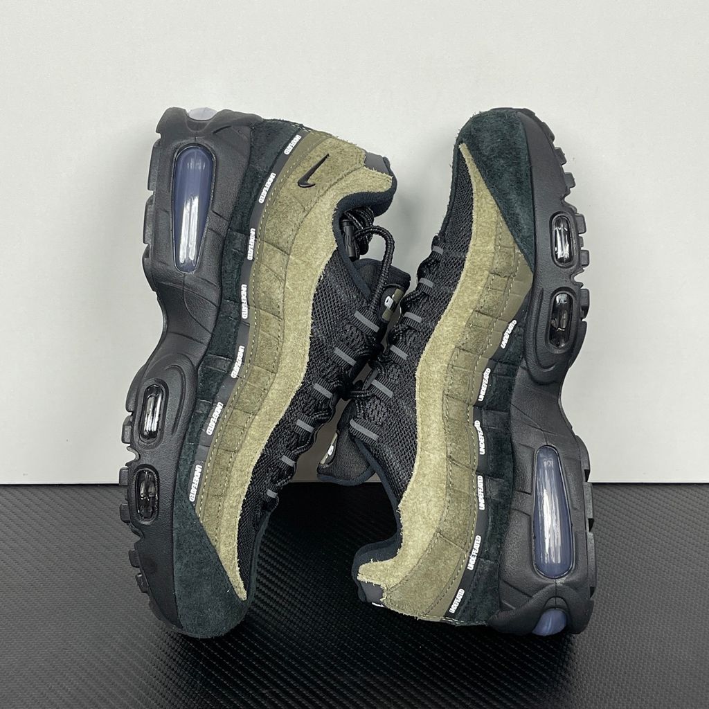 Nike Air Max 95 SP x Undefeated "Geo La Brea" sneaker featuring a layered gradient upper in Medium Olive and dark green tones, premium suede construction, and a contrasting black midsole, SKU IB4523-200.