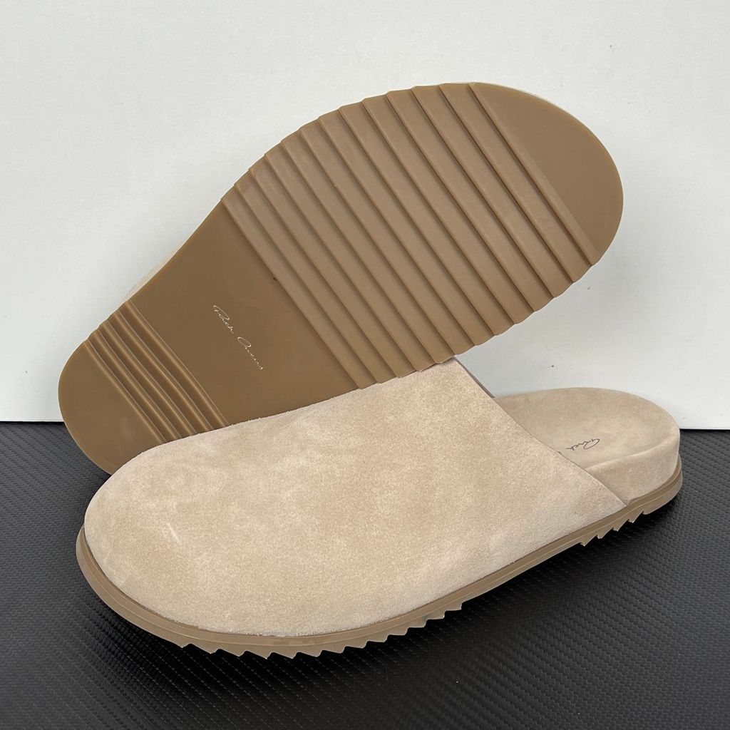Side profile of the Rick Owens Mainline premium suede closed-toe Megalace Mule in Granola Brown, featuring a minimalist silhouette and textured finish.