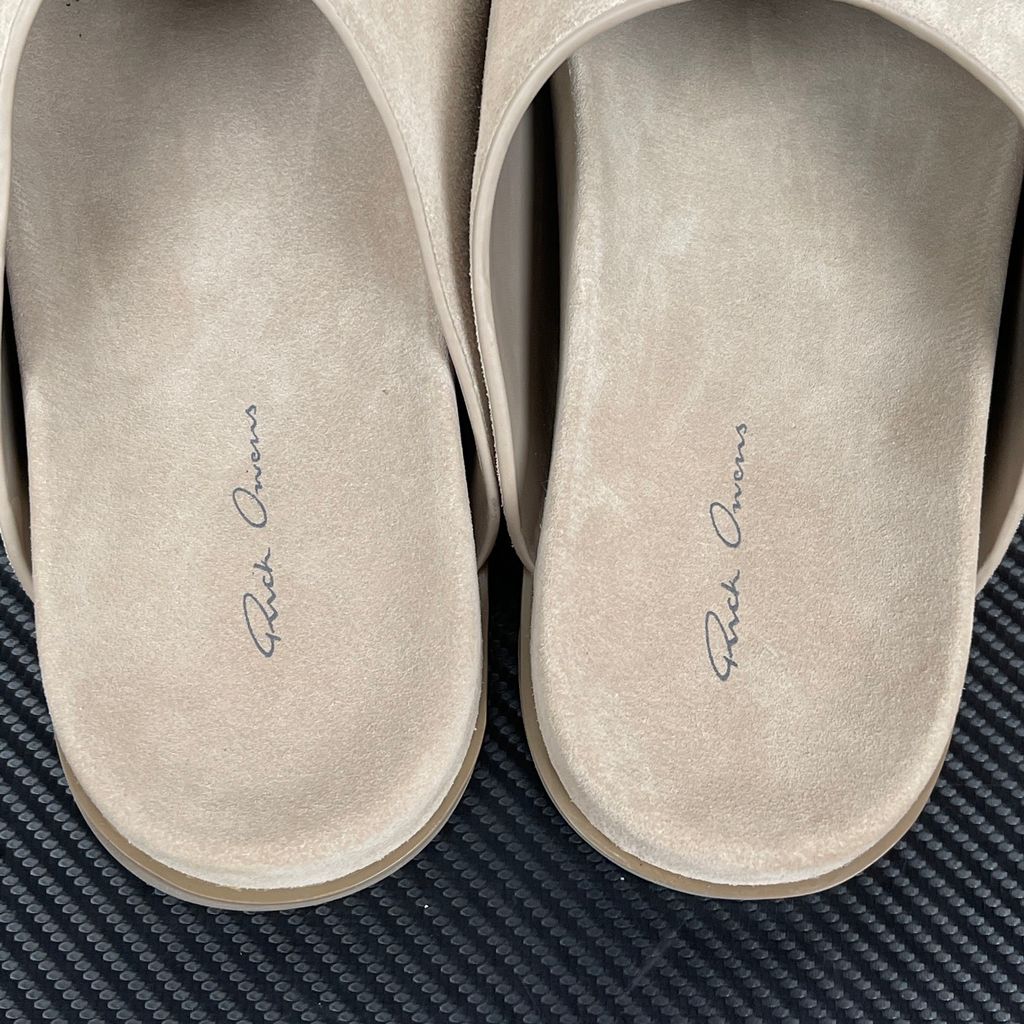 Side profile of the Rick Owens Mainline premium suede closed-toe Megalace Mule in Granola Brown, featuring a minimalist silhouette and textured finish.